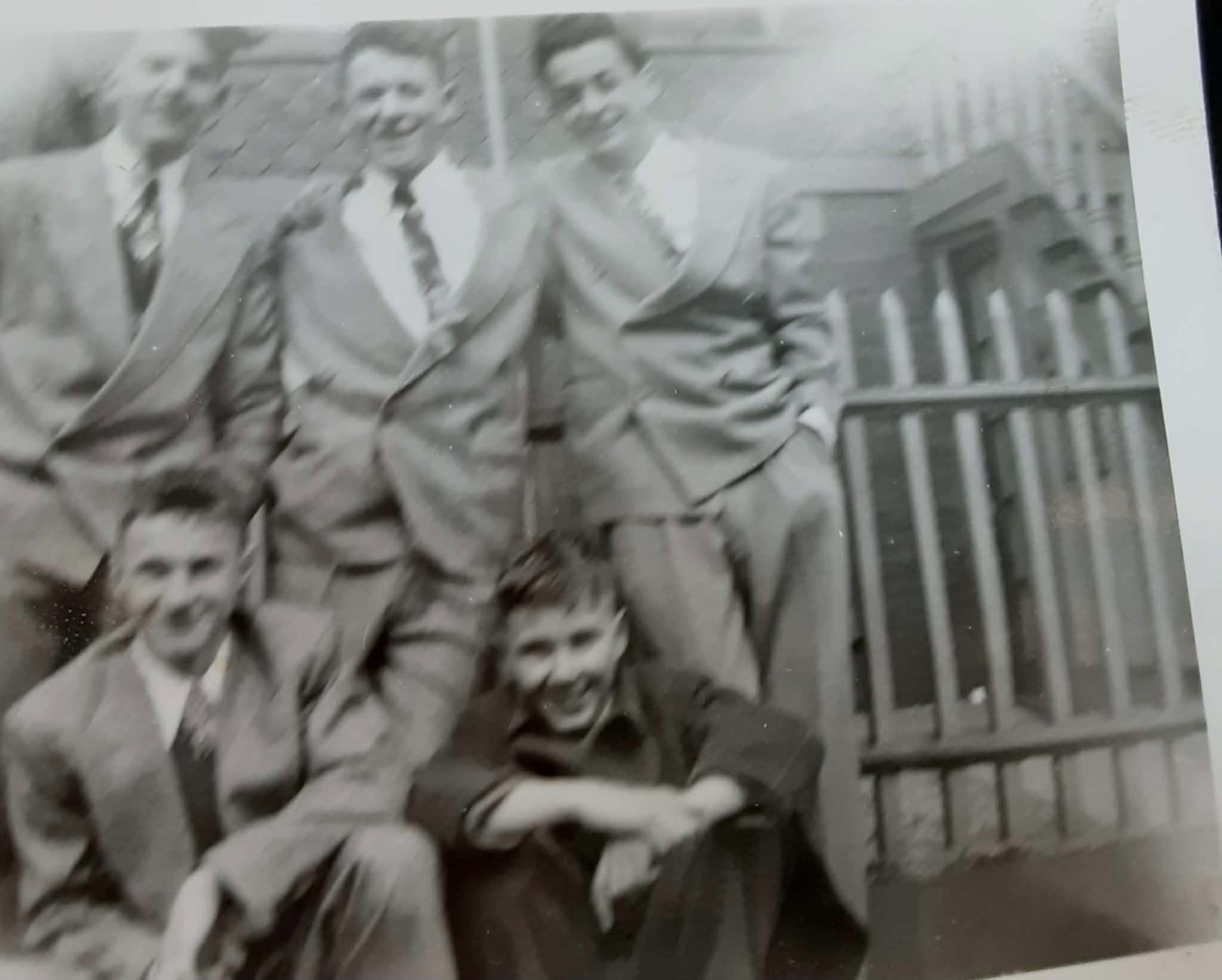 "Bill Artz and the Boys of Windsor," 1948 — five young men in suits on a Windsor Place stoop.